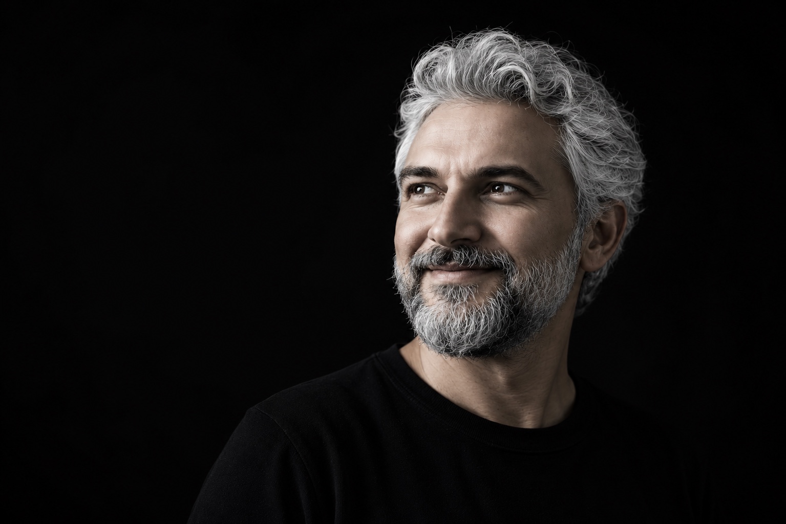 Black and white portrait of Uğur Erden